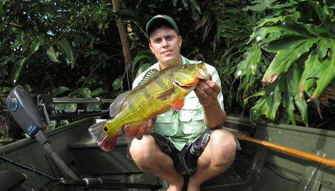 guy with peacock bass