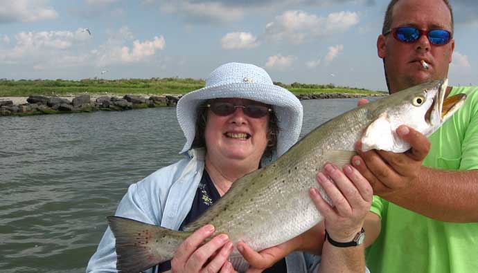 speckled trout fishing tips woman holding fish