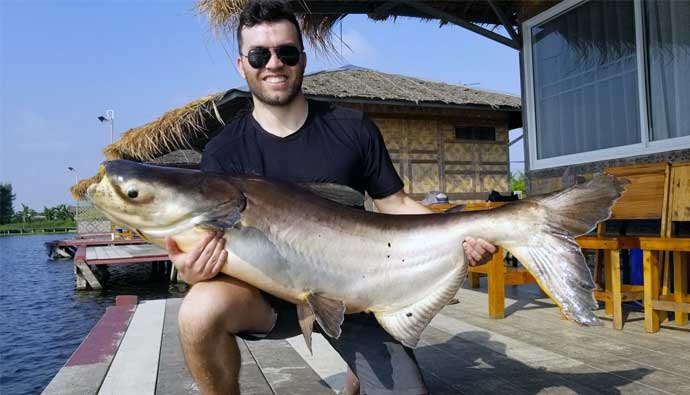 Jon Stenstrom with a Mekong Catfish at Bungsamran