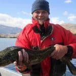 fisherman with a burbot