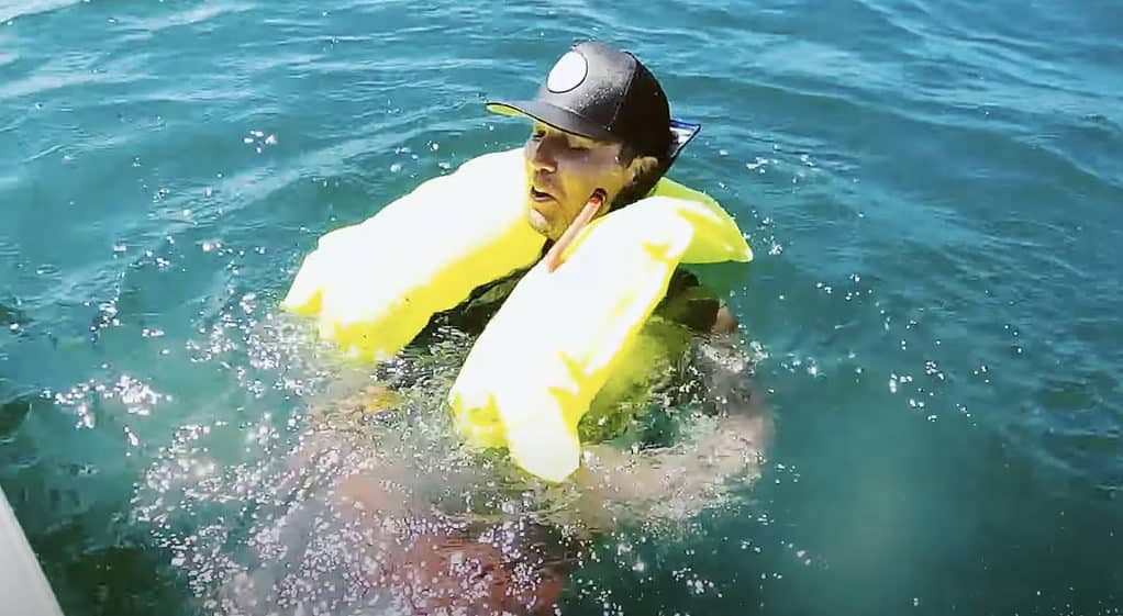 Jon testing the inflatable life jacket in the ocean