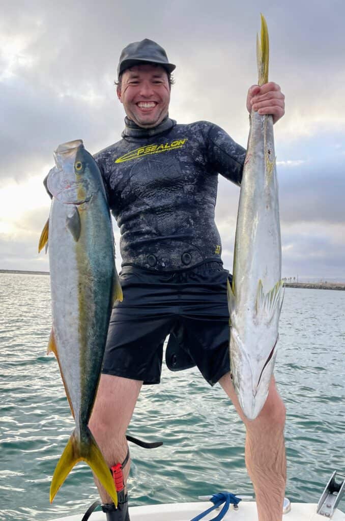 jon stenstrom with two speared yellowtail